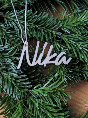 https://woelkchen.nrw/Shop/Weihnachten/artikel_Geschenkanhaenger-Holz-Schriftzug-Name_193.html